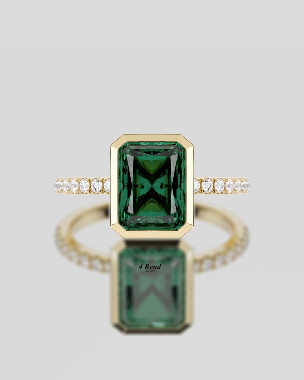 Photorealistic 3D render of a green emerald-cut gemstone engagement ring in yellow gold with a pavé diamond band, bezel setting, front view — by 4rend Studio