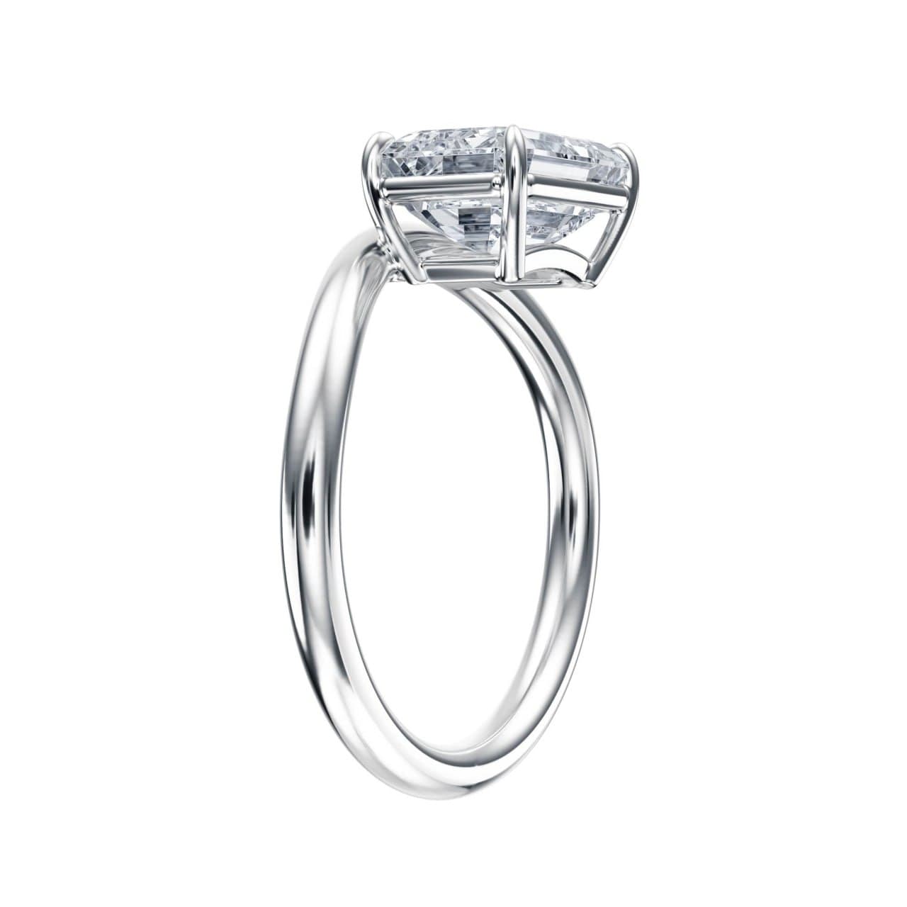 Three-quarter angle render of the east-west emerald-cut solitaire in white gold