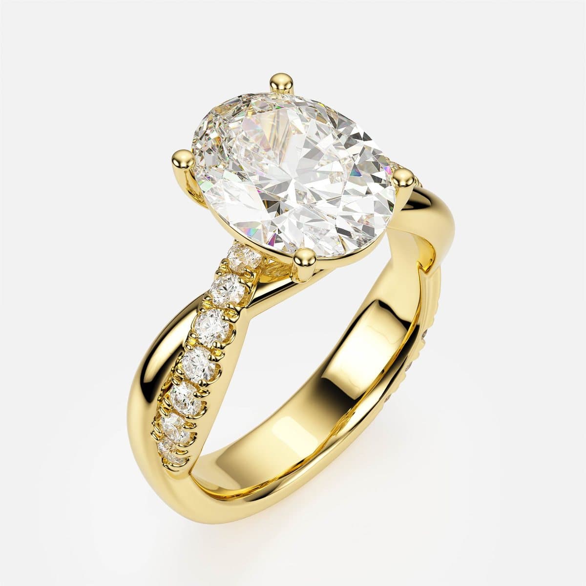 nanea Entwined Light engagement ring in yellow gold — a solitaire on a crossover pavé band