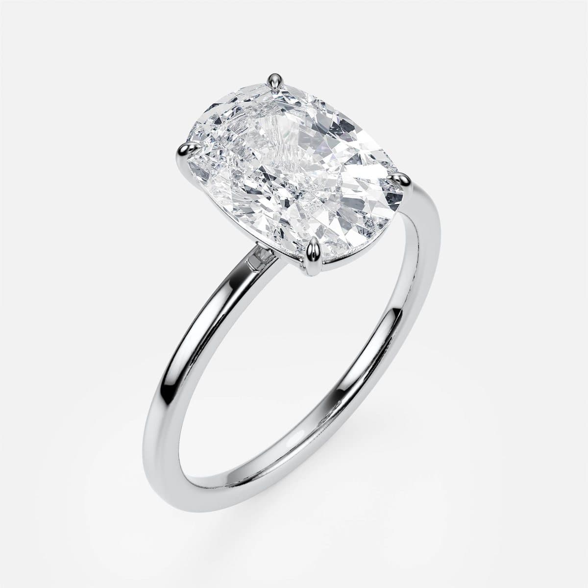 nanea Pure Line solitaire in white gold with an emerald-cut centre stone