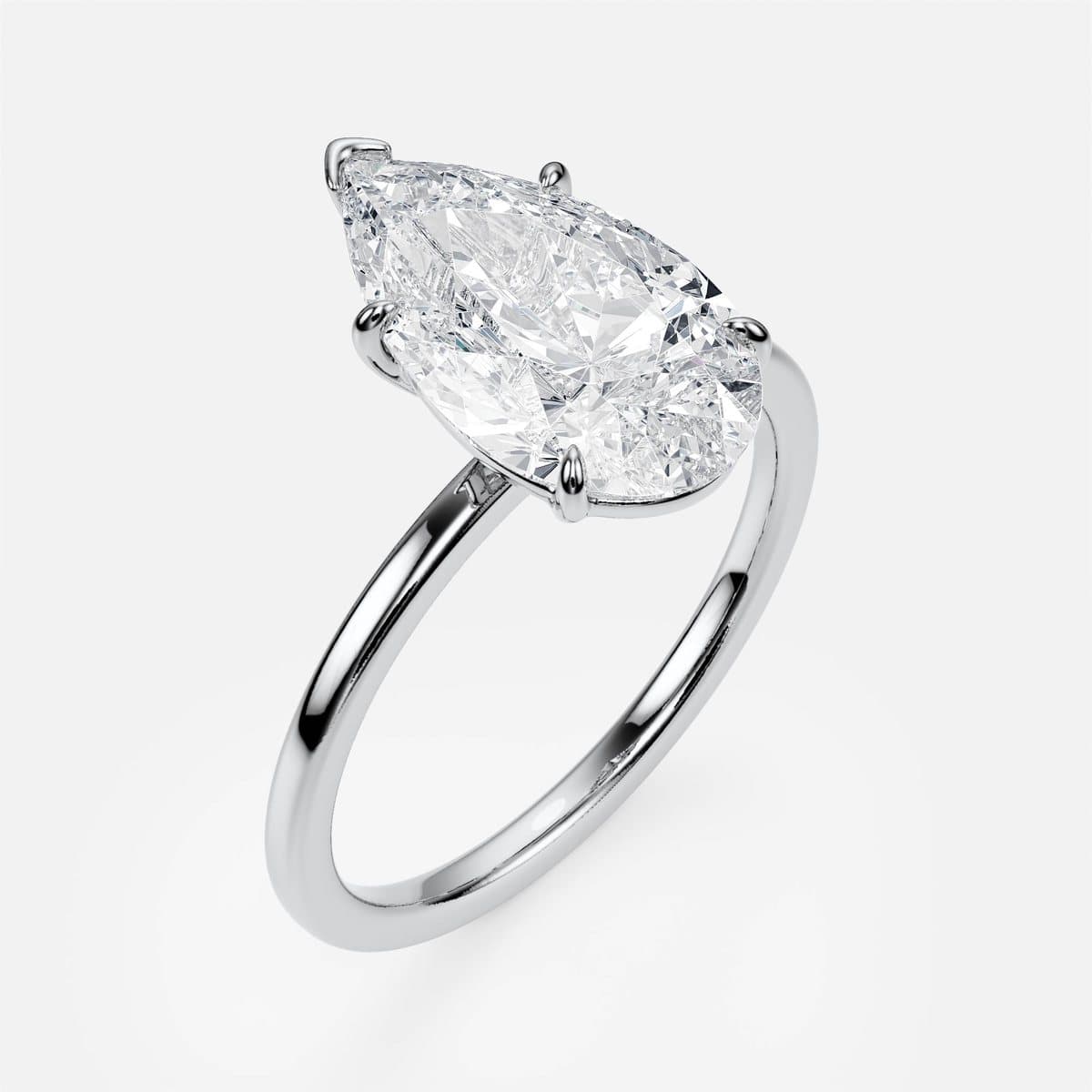 nanea Pure Line solitaire in white gold with a pear-cut centre stone