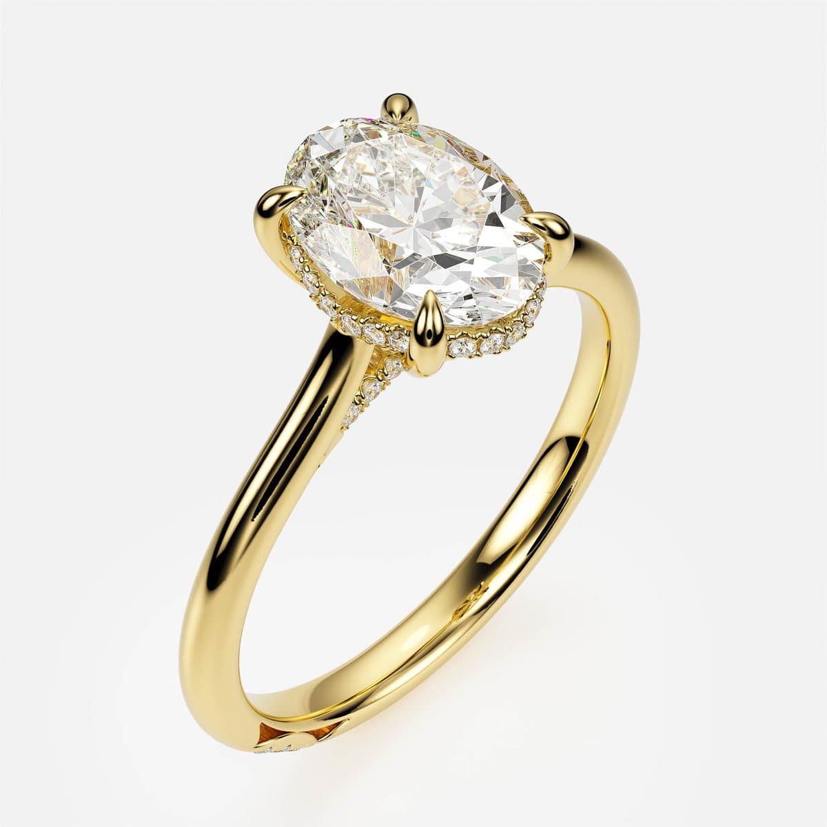 nanea Secret Cathedral engagement ring in yellow gold — an oval solitaire with a hidden halo on arched shoulders