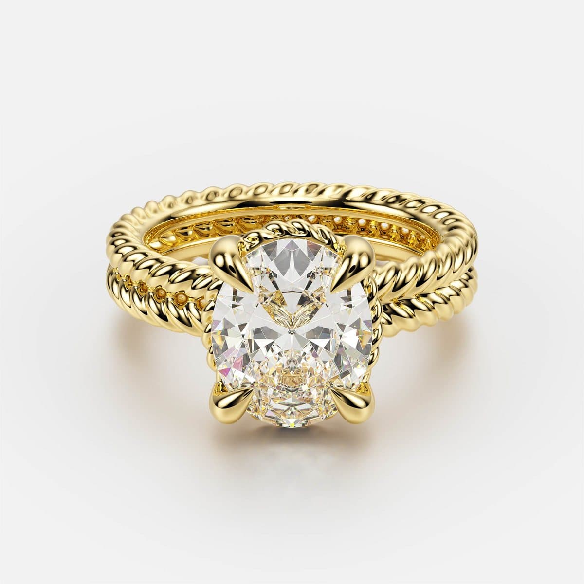 nanea Twin Rope engagement ring in yellow gold, top view showing the oval stone and four claws