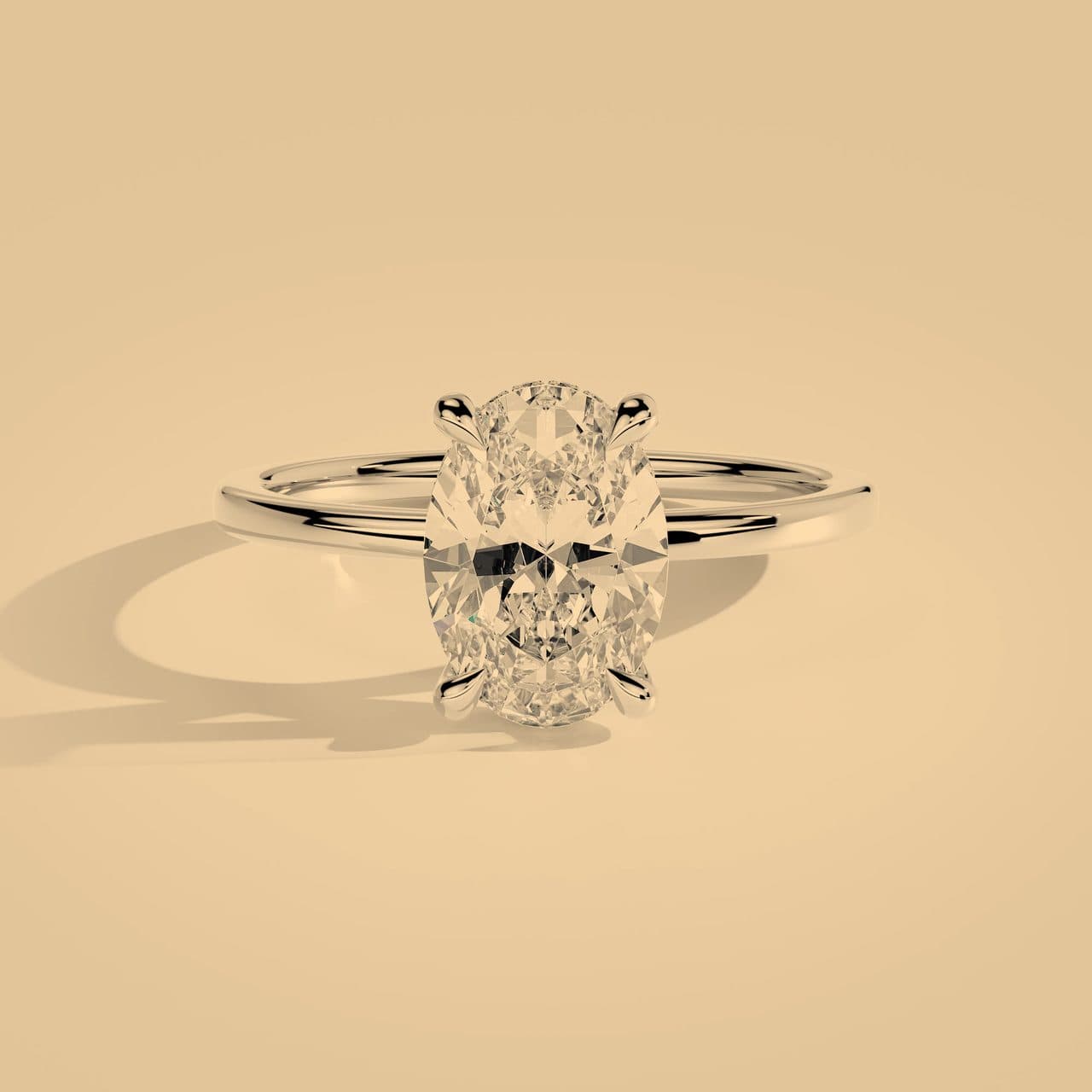 The same white gold solitaire image shifted toward warm 2700 K lamp light, the metal and diamond both looking creamy yellow