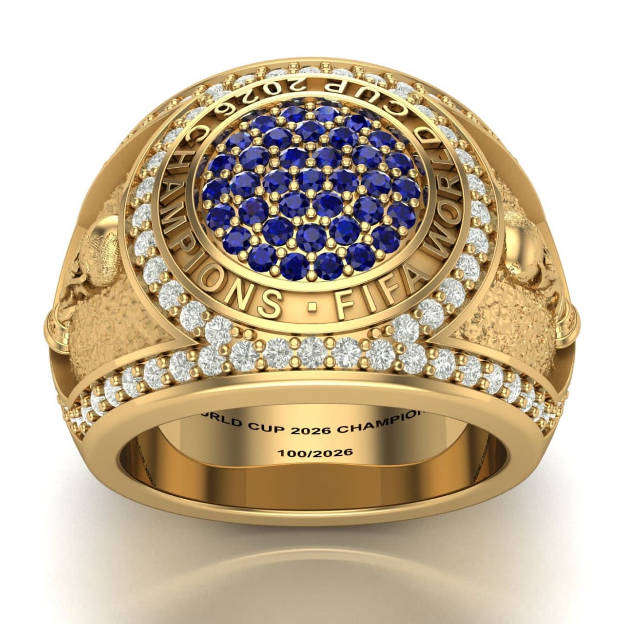 Photorealistic 3D render of a World Cup 2026 champions-style ring in yellow gold with a blue sapphire pavé face, diamond halo and engraved bezel — championship ring concept by 4rend Studio