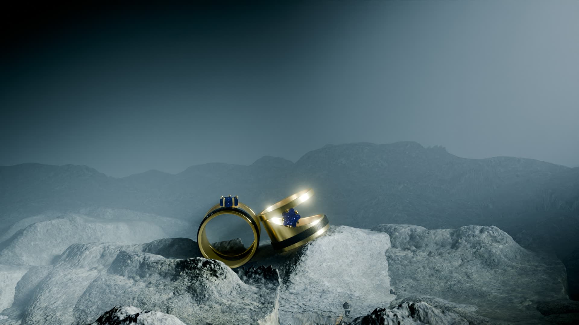 Two gold rings with blue gemstones rendered in a cinematic mountain-and-rock environment — the free Blender jewelry render studio scene by 4rend Studio