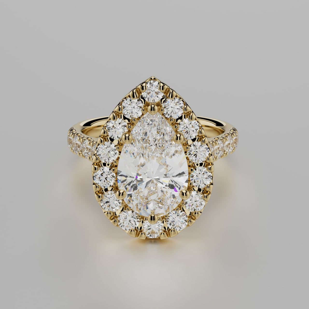 Pear-cut diamond halo engagement ring in yellow gold, front view — photorealistic 3D render produced by 4rend Studio for a custom jewelry order